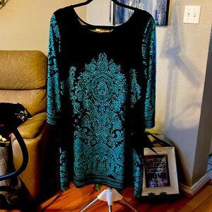 Attractive western style dress, so cute with boots. Size Larger